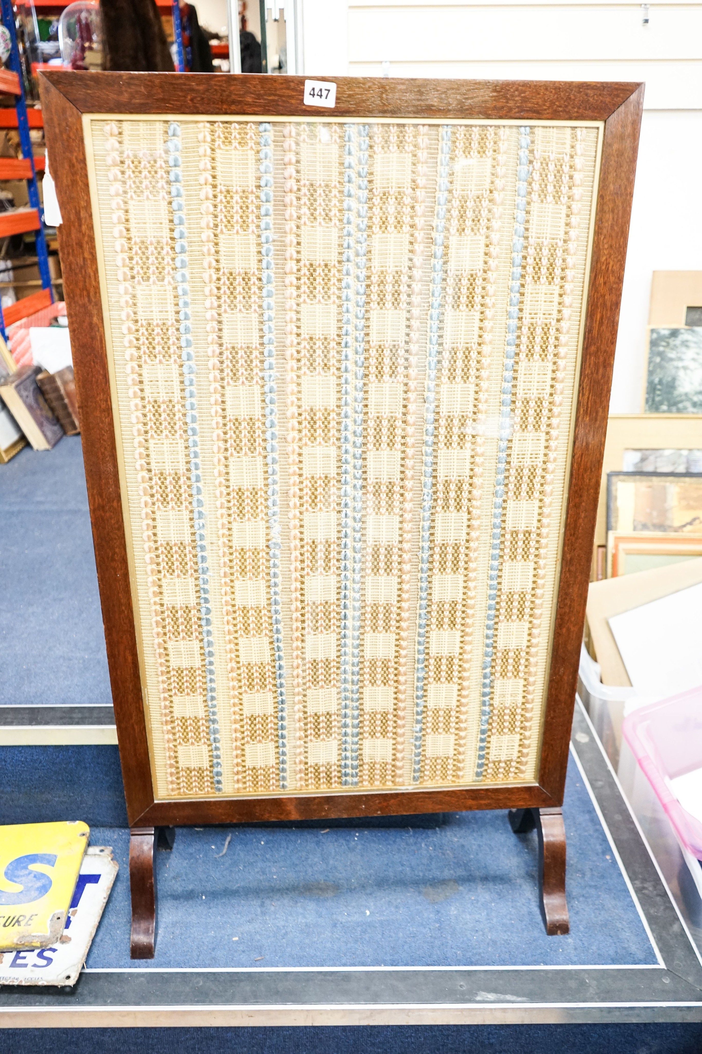 A mahogany cased and glazed embroidered fire screen of Royal interest 108 x 62cm.